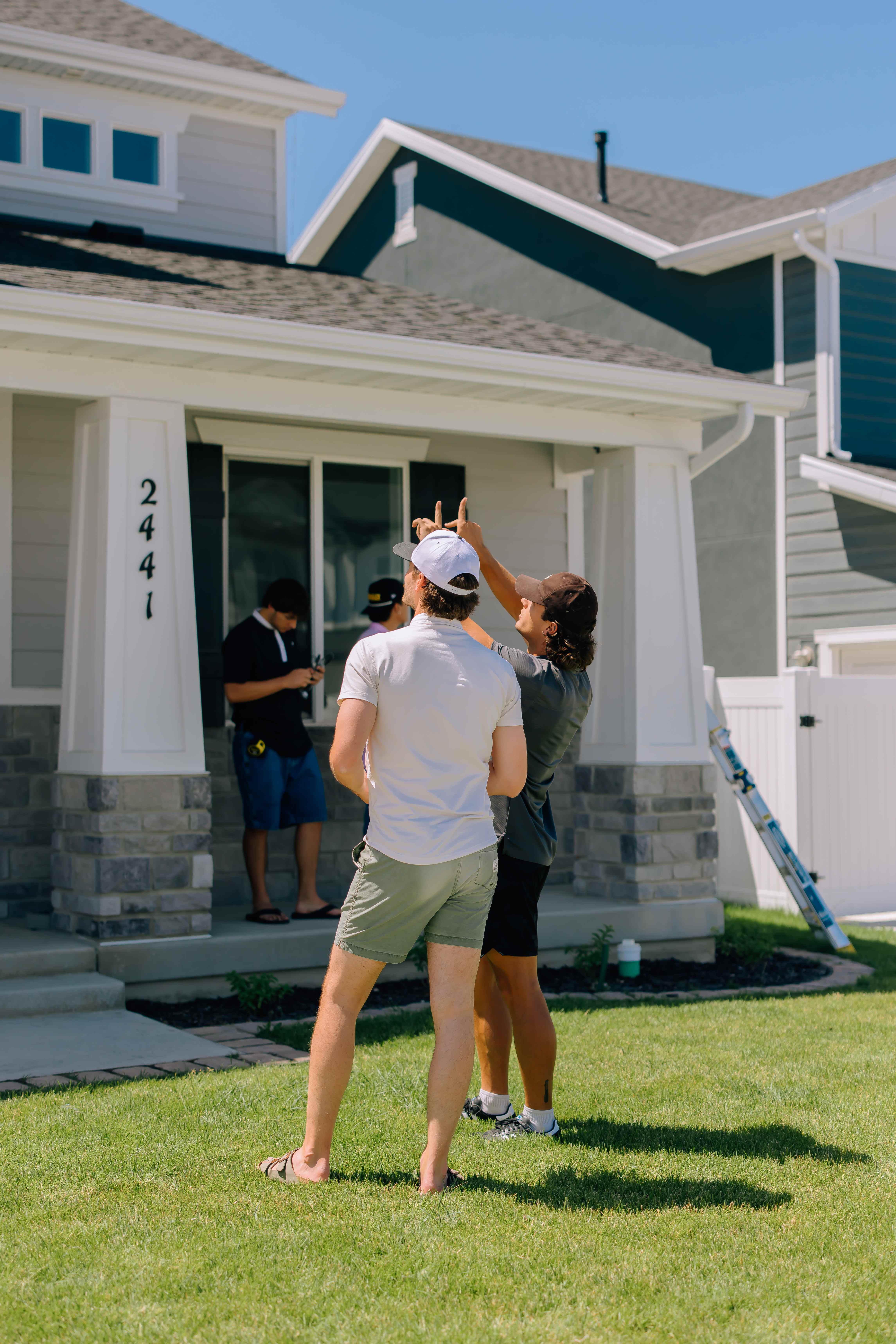 Chipr Lux team members consulting with a homeowner